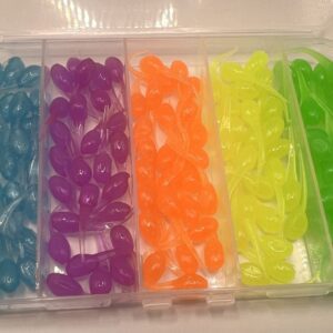 A plastic container filled with different colored beads.