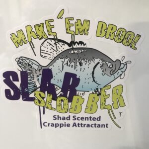 A sticker of a crappie fish with the words " make ' em drool " on it.